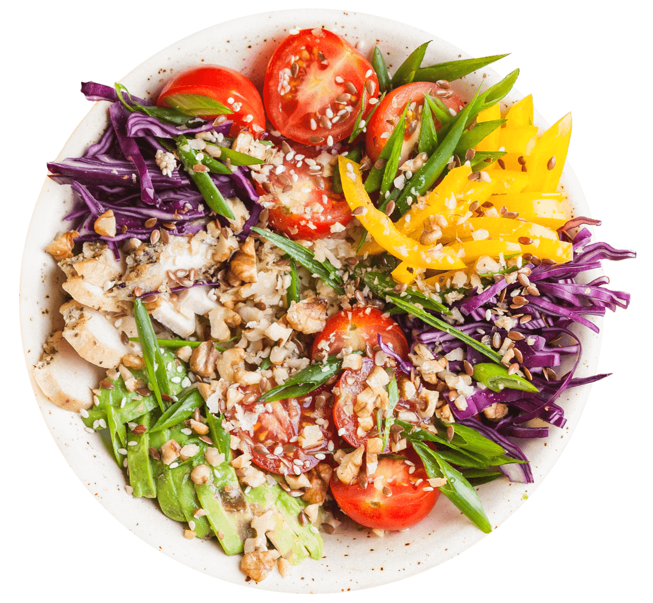 Bunte Salatschüssel mit Tomaten, Paprika, Rotkohl, Nüssen und Sesam, ideal für gesunde Ernährung.